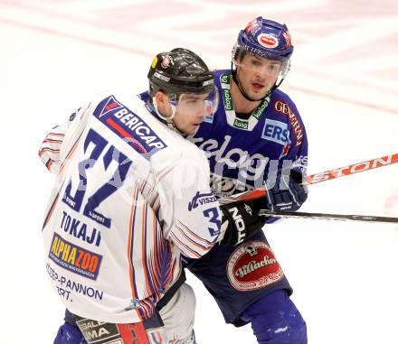 EBEL. Eishockey Bundesliga. EC Rekordfenster VSV gegen SAPA Fehervar AV19. Mario Altmann, (VSV), Viktor Tokaji (Alba Volan). Villach, am 14.1.2011.
Foto: Kuess

---
pressefotos, pressefotografie, kuess, qs, qspictures, sport, bild, bilder, bilddatenbank