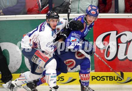 EBEL. Eishockey Bundesliga. EC Rekordfenster VSV gegen SAPA Fehervar AV19. Stefan Bacher, (VSV), Istvan Sofron (Alba Volan). Villach, am 14.1.2011.
Foto: Kuess

---
pressefotos, pressefotografie, kuess, qs, qspictures, sport, bild, bilder, bilddatenbank