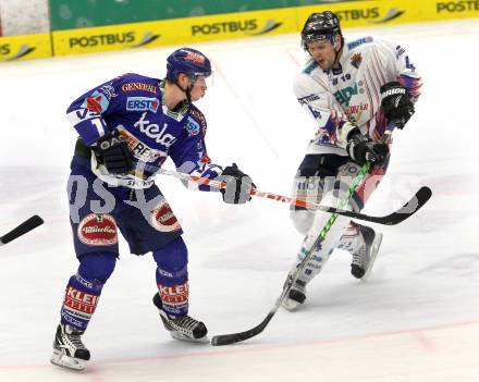 EBEL. Eishockey Bundesliga. EC Rekordfenster VSV gegen SAPA Fehervar AV19. Michael Raffl, (VSV), Andras Horvath (Alba Volan). Villach, am 14.1.2011.
Foto: Kuess

---
pressefotos, pressefotografie, kuess, qs, qspictures, sport, bild, bilder, bilddatenbank