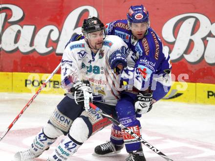 EBEL. Eishockey Bundesliga. EC Rekordfenster VSV gegen SAPA Fehervar AV19. Greg Kuznik, (VSV), Oscar Ackestroem (Alba Volan). Villach, am 14.1.2011.
Foto: Kuess

---
pressefotos, pressefotografie, kuess, qs, qspictures, sport, bild, bilder, bilddatenbank