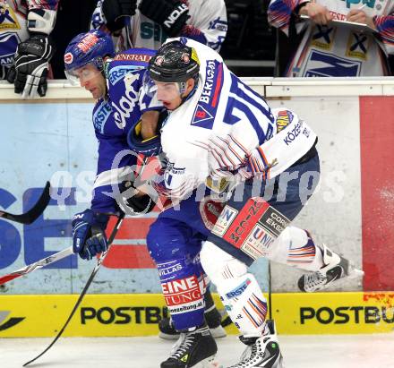 EBEL. Eishockey Bundesliga. EC Rekordfenster VSV gegen SAPA Fehervar AV19. Greg Kuznik, (VSV), Istvan Sofron (Alba Volan). Villach, am 14.1.2011.
Foto: Kuess

---
pressefotos, pressefotografie, kuess, qs, qspictures, sport, bild, bilder, bilddatenbank