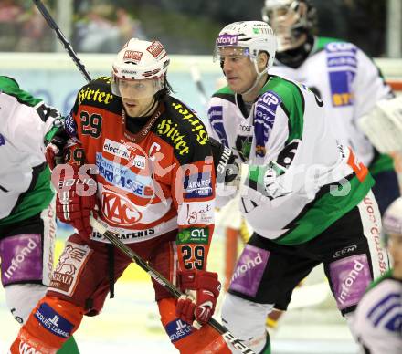 EBEL. Eishockey Bundesliga. EC KAC gegen HDD TILIA Olimpija Ljubljana. Christoph Brandner, (KAC), Bostjan Groznik (Laibach). Klagenfurt, am 16.1.2011.
Foto: Kuess 

---
pressefotos, pressefotografie, kuess, qs, qspictures, sport, bild, bilder, bilddatenbank