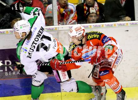 EBEL. Eishockey Bundesliga. EC KAC gegen HDD TILIA Olimpija Ljubljana. Herbert Ratz, (KAC), Tomi Mustonen (Laibach). Klagenfurt, am 16.1.2011.
Foto: Kuess 

---
pressefotos, pressefotografie, kuess, qs, qspictures, sport, bild, bilder, bilddatenbank