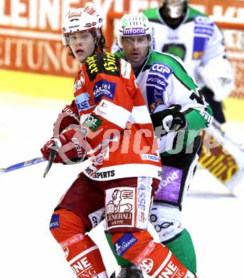 EBEL. Eishockey Bundesliga. EC KAC gegen HDD TILIA Olimpija Ljubljana. Thomas HUndertpfund, (KAC),  Matej Hocevar (Laibach). Klagenfurt, am 16.1.2011.
Foto: Kuess 

---
pressefotos, pressefotografie, kuess, qs, qspictures, sport, bild, bilder, bilddatenbank