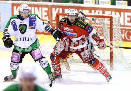 EBEL. Eishockey Bundesliga. EC KAC gegen HDD TILIA Olimpija Ljubljana. Gregor Hager, (KAC), Nejc Berlisk (Laibach). Klagenfurt, am 16.1.2011.
Foto: Kuess 

---
pressefotos, pressefotografie, kuess, qs, qspictures, sport, bild, bilder, bilddatenbank