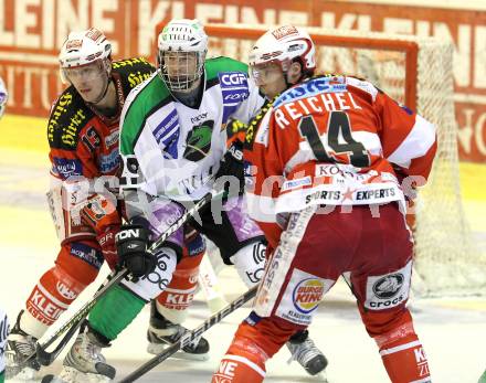 EBEL. Eishockey Bundesliga. EC KAC gegen HDD TILIA Olimpija Ljubljana. Johannes Kirisits, Johannes Reichel, (KAC), Anze Ropret (Laibach). Klagenfurt, am 16.1.2011.
Foto: Kuess 

---
pressefotos, pressefotografie, kuess, qs, qspictures, sport, bild, bilder, bilddatenbank