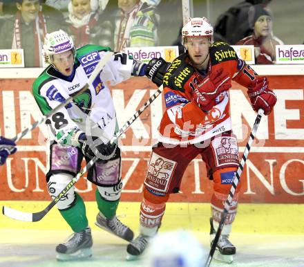 EBEL. Eishockey Bundesliga. EC KAC gegen HDD TILIA Olimpija Ljubljana. Johannes Kirisits, (KAC), Nejc Berlisk (Laibach). Klagenfurt, am 16.1.2011.
Foto: Kuess 

---
pressefotos, pressefotografie, kuess, qs, qspictures, sport, bild, bilder, bilddatenbank