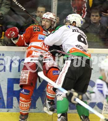 EBEL. Eishockey Bundesliga. EC KAC gegen HDD TILIA Olimpija Ljubljana. Kirk Furey, (KAC), Burke Henry (Laibach). Klagenfurt, am 16.1.2011.
Foto: Kuess 

---
pressefotos, pressefotografie, kuess, qs, qspictures, sport, bild, bilder, bilddatenbank