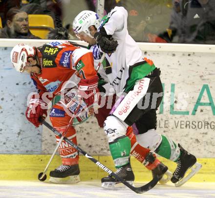 EBEL. Eishockey Bundesliga. EC KAC gegen HDD TILIA Olimpija Ljubljana. Gregor Hager, (KAC), John Hughes (Laibach). Klagenfurt, am 16.1.2011.
Foto: Kuess 

---
pressefotos, pressefotografie, kuess, qs, qspictures, sport, bild, bilder, bilddatenbank