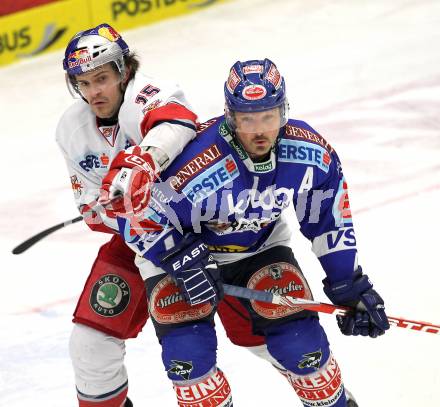 EBEL. Eishockey Bundesliga. EC  VSV gegen EC Red Bull Salzburg.  Gerhard Unterluggauer, (VSV), Manuel Latusa (Salzburg). Villach, am 21.1.2011.
Foto: Kuess 


---
pressefotos, pressefotografie, kuess, qs, qspictures, sport, bild, bilder, bilddatenbank