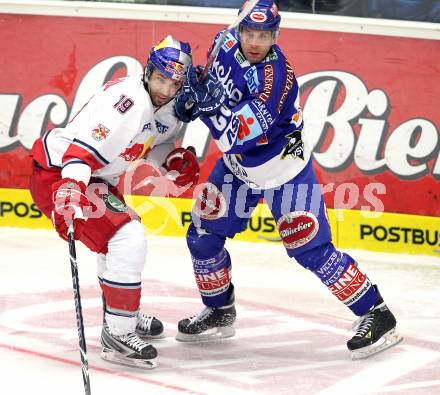 EBEL. Eishockey Bundesliga. EC  VSV gegen EC Red Bull Salzburg.  Greg Kuznik, (VSV), Abid Ramzi (Salzburg). Villach, am 21.1.2011.
Foto: Kuess 


---
pressefotos, pressefotografie, kuess, qs, qspictures, sport, bild, bilder, bilddatenbank