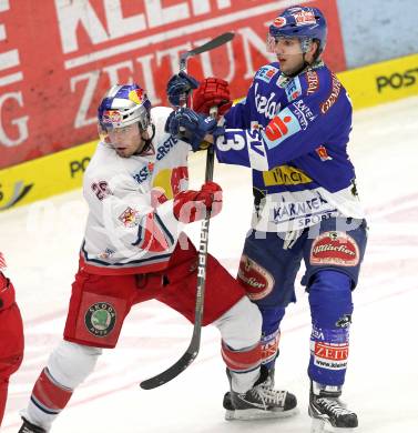 EBEL. Eishockey Bundesliga. EC  VSV gegen EC Red Bull Salzburg.  Benjamin Petrik, (VSV), Brent Aubin (Salzburg). Villach, am 21.1.2011.
Foto: Kuess 


---
pressefotos, pressefotografie, kuess, qs, qspictures, sport, bild, bilder, bilddatenbank