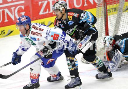 EBEL. Eishockey Bundesliga. EC  VSV gegen EHC LIWEST Linz. Tomaz Razingar, (VSV), Recaredo Bronilla  (Linz). Villach, am 23.1.2011.
Foto: Kuess 


---
pressefotos, pressefotografie, kuess, qs, qspictures, sport, bild, bilder, bilddatenbank