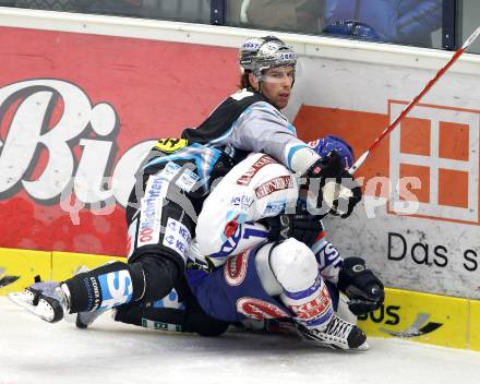 EBEL. Eishockey Bundesliga. EC  VSV gegen EHC LIWEST Linz.  Michael Raffl, (VSV), Aaron McKenzie (Linz). Villach, am 23.1.2011.
Foto: Kuess 


---
pressefotos, pressefotografie, kuess, qs, qspictures, sport, bild, bilder, bilddatenbank