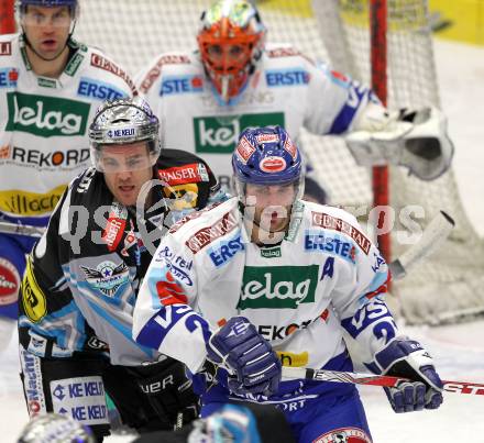 EBEL. Eishockey Bundesliga. EC  VSV gegen EHC LIWEST Linz.  Nikolas Petrik,  (VSV), Brad Purdie (Linz). Villach, am 23.1.2011.
Foto: Kuess 


---
pressefotos, pressefotografie, kuess, qs, qspictures, sport, bild, bilder, bilddatenbank