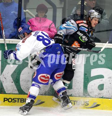 EBEL. Eishockey Bundesliga. EC  VSV gegen EHC LIWEST Linz.  Jonathan Ferland, (VSV), Franklin MacDonald (Linz). Villach, am 23.1.2011.
Foto: Kuess 


---
pressefotos, pressefotografie, kuess, qs, qspictures, sport, bild, bilder, bilddatenbank