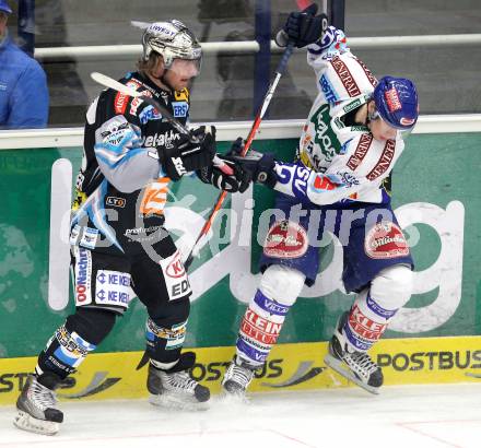 EBEL. Eishockey Bundesliga. EC  VSV gegen EHC LIWEST Linz.  Michael Raffl, (VSV), Markus Schlacher (Linz). Villach, am 23.1.2011.
Foto: Kuess 


---
pressefotos, pressefotografie, kuess, qs, qspictures, sport, bild, bilder, bilddatenbank