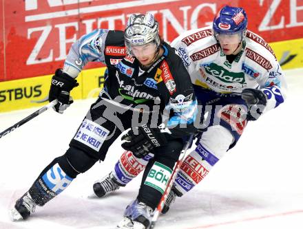 EBEL. Eishockey Bundesliga. EC  VSV gegen EHC LIWEST Linz. Michael Raffl, (VSV), Aaron McKenzie  (Linz). Villach, am 23.1.2011.
Foto: Kuess 


---
pressefotos, pressefotografie, kuess, qs, qspictures, sport, bild, bilder, bilddatenbank