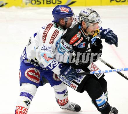 EBEL. Eishockey Bundesliga. EC  VSV gegen EHC LIWEST Linz. Roland Kaspitz,  (VSV), Brad Purdie (Linz). Villach, am 23.1.2011.
Foto: Kuess 


---
pressefotos, pressefotografie, kuess, qs, qspictures, sport, bild, bilder, bilddatenbank