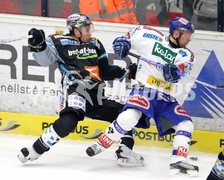 EBEL. Eishockey Bundesliga. EC  VSV gegen EHC LIWEST Linz. Roland Kaspitz, (VSV), Robert Lukas  (Linz). Villach, am 23.1.2011.
Foto: Kuess 


---
pressefotos, pressefotografie, kuess, qs, qspictures, sport, bild, bilder, bilddatenbank