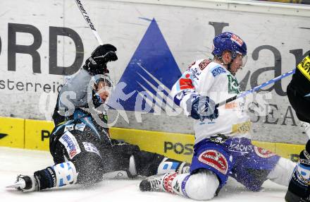 EBEL. Eishockey Bundesliga. EC  VSV gegen EHC LIWEST Linz. Roland Kaspitz,  (VSV), Robert Lukas (Linz). Villach, am 23.1.2011.
Foto: Kuess 


---
pressefotos, pressefotografie, kuess, qs, qspictures, sport, bild, bilder, bilddatenbank