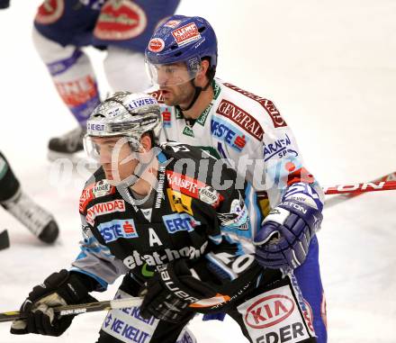 EBEL. Eishockey Bundesliga. EC  VSV gegen EHC LIWEST Linz.  Nikolas Petrik, (VSV), Brad Purdie (Linz). Villach, am 23.1.2011.
Foto: Kuess 


---
pressefotos, pressefotografie, kuess, qs, qspictures, sport, bild, bilder, bilddatenbank