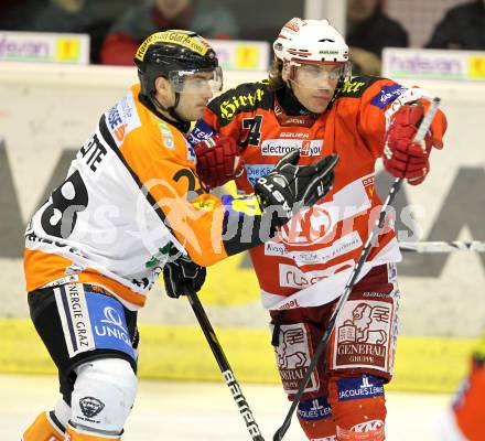 EBEL. Eishockey Bundesliga. KAC gegen Graz 99ers. Dieter Kalt,  (KAC), Michael Ouellette (Graz). Klagenfurt, am 25.1.2011.
Foto: Kuess 

---
pressefotos, pressefotografie, kuess, qs, qspictures, sport, bild, bilder, bilddatenbank