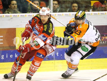 EBEL. Eishockey Bundesliga. KAC gegen Graz 99ers.  Christoph Brandner, (KAC), Florian Iberer (Graz). Klagenfurt, am 25.1.2011.
Foto: Kuess 

---
pressefotos, pressefotografie, kuess, qs, qspictures, sport, bild, bilder, bilddatenbank