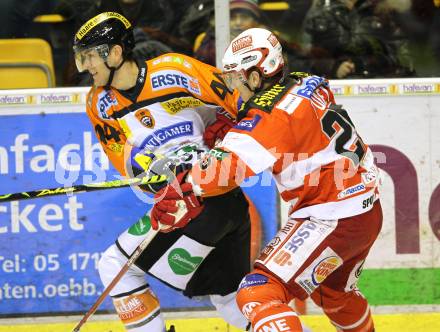 EBEL. Eishockey Bundesliga. KAC gegen Graz 99ers.  Kirk Furey, (KAC),  Quinn Hancock (Graz). Klagenfurt, am 25.1.2011.
Foto: Kuess 

---
pressefotos, pressefotografie, kuess, qs, qspictures, sport, bild, bilder, bilddatenbank