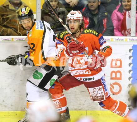 EBEL. Eishockey Bundesliga. KAC gegen Graz 99ers. Martin Schumnig,  (KAC), Jean Philippe Pare (Graz). Klagenfurt, am 25.1.2011.
Foto: Kuess 

---
pressefotos, pressefotografie, kuess, qs, qspictures, sport, bild, bilder, bilddatenbank