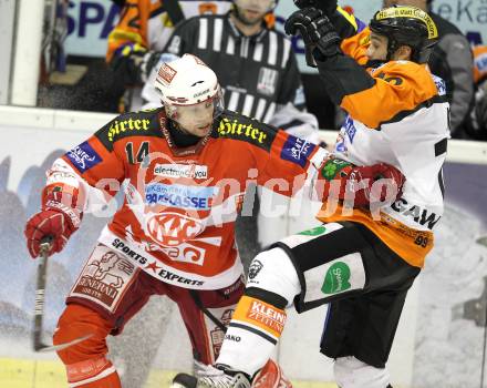 EBEL. Eishockey Bundesliga. KAC gegen Graz 99ers. Johannes Reichel,  (KAC), Warren Norris (Graz). Klagenfurt, am 25.1.2011.
Foto: Kuess 

---
pressefotos, pressefotografie, kuess, qs, qspictures, sport, bild, bilder, bilddatenbank