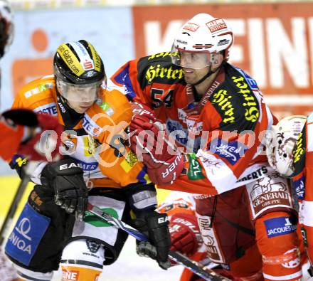 EBEL. Eishockey Bundesliga. KAC gegen Graz 99ers. Andrew Schneider,  (KAC), Peter Lenes (Graz). Klagenfurt, am 25.1.2011.
Foto: Kuess 

---
pressefotos, pressefotografie, kuess, qs, qspictures, sport, bild, bilder, bilddatenbank