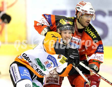 EBEL. Eishockey Bundesliga. KAC gegen Graz 99ers. Sean Brown, (KAC), Harry Lange  (Graz). Klagenfurt, am 25.1.2011.
Foto: Kuess 

---
pressefotos, pressefotografie, kuess, qs, qspictures, sport, bild, bilder, bilddatenbank