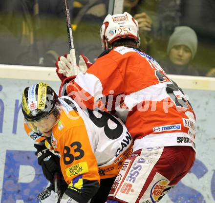 EBEL. Eishockey Bundesliga. KAC gegen Graz 99ers. Kirk Furey,  (KAC),  Peter Lenes (Graz). Klagenfurt, am 25.1.2011.
Foto: Kuess 

---
pressefotos, pressefotografie, kuess, qs, qspictures, sport, bild, bilder, bilddatenbank