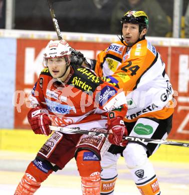 EBEL. Eishockey Bundesliga. KAC gegen Graz 99ers. Tyler Spurgeon,  (KAC), Darcy Werenka (Graz). Klagenfurt, am 25.1.2011.
Foto: Kuess 

---
pressefotos, pressefotografie, kuess, qs, qspictures, sport, bild, bilder, bilddatenbank