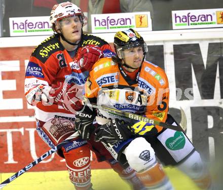 EBEL. Eishockey Bundesliga. KAC gegen Graz 99ers.  Manuel Geier, (KAC), Christoph Harand (Graz). Klagenfurt, am 25.1.2011.
Foto: Kuess 

---
pressefotos, pressefotografie, kuess, qs, qspictures, sport, bild, bilder, bilddatenbank