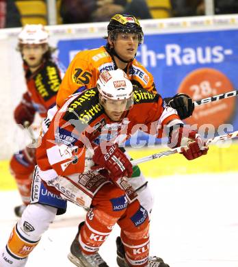 EBEL. Eishockey Bundesliga. KAC gegen Graz 99ers. Peter Ratchuk,  (KAC), Matthias Iberer (Graz). Klagenfurt, am 25.1.2011.
Foto: Kuess 

---
pressefotos, pressefotografie, kuess, qs, qspictures, sport, bild, bilder, bilddatenbank