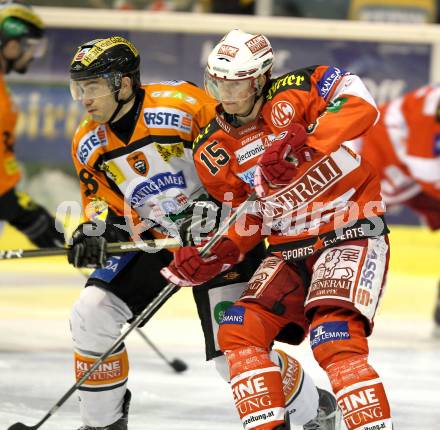 EBEL. Eishockey Bundesliga. KAC gegen Graz 99ers. Paul Schellander,  (KAC), Michael Ouellette (Graz). Klagenfurt, am 25.1.2011.
Foto: Kuess 

---
pressefotos, pressefotografie, kuess, qs, qspictures, sport, bild, bilder, bilddatenbank