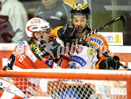 EBEL. Eishockey Bundesliga. KAC gegen Graz 99ers. Johannes Kirisits,  (KAC), Jean Philippe Pare (Graz). Klagenfurt, am 25.1.2011.
Foto: Kuess 

---
pressefotos, pressefotografie, kuess, qs, qspictures, sport, bild, bilder, bilddatenbank