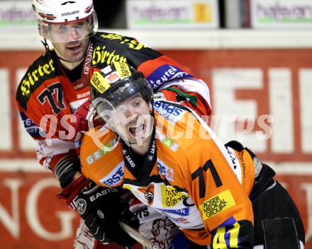 EBEL. Eishockey Bundesliga. KAC gegen Graz 99ers. Sean Brown,  (KAC), Harry Lange (Graz). Klagenfurt, am 25.1.2011.
Foto: Kuess 

---
pressefotos, pressefotografie, kuess, qs, qspictures, sport, bild, bilder, bilddatenbank