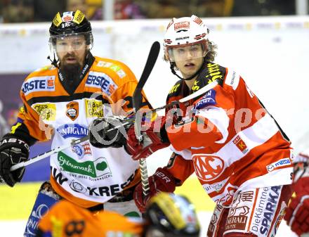 EBEL. Eishockey Bundesliga. KAC gegen Graz 99ers. Raphael Herburger,  (KAC), Markus Peintner (Graz). Klagenfurt, am 25.1.2011.
Foto: Kuess 

---
pressefotos, pressefotografie, kuess, qs, qspictures, sport, bild, bilder, bilddatenbank