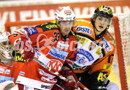 EBEL. Eishockey Bundesliga. KAC gegen Graz 99ers. Peter Ratchuk,  (KAC), Manuel Ganahl (Graz). Klagenfurt, am 25.1.2011.
Foto: Kuess 

---
pressefotos, pressefotografie, kuess, qs, qspictures, sport, bild, bilder, bilddatenbank