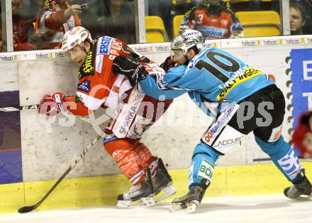 EBEL. Eishockey Bundesliga. KAC gegen EHC LIWEST BLACK WINGS LINZ. Tyler Spurgeon, (KAC), Reid Casman (Linz). Klagenfurt, am 28.1.2011.
Foto: Kuess 

---
pressefotos, pressefotografie, kuess, qs, qspictures, sport, bild, bilder, bilddatenbank