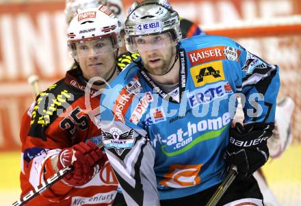 EBEL. Eishockey Bundesliga. KAC gegen EHC LIWEST BLACK WINGS LINZ. Kirk Furey, (KAC), Jason Ward (Linz). Klagenfurt, am 28.1.2011.
Foto: Kuess 

---
pressefotos, pressefotografie, kuess, qs, qspictures, sport, bild, bilder, bilddatenbank