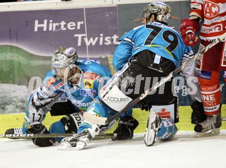 EBEL. Eishockey Bundesliga. KAC gegen EHC LIWEST BLACK WINGS LINZ. Jason Ward, Gregor Baumgartner  (Linz). Klagenfurt, am 28.1.2011.
Foto: Kuess 

---
pressefotos, pressefotografie, kuess, qs, qspictures, sport, bild, bilder, bilddatenbank