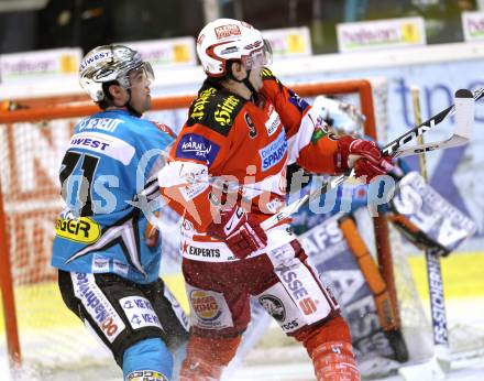 EBEL. Eishockey Bundesliga. KAC gegen EHC LIWEST BLACK WINGS LINZ. Tyler Spurgeon, (KAC), Patrick Leahy (Linz). Klagenfurt, am 28.1.2011.
Foto: Kuess 

---
pressefotos, pressefotografie, kuess, qs, qspictures, sport, bild, bilder, bilddatenbank