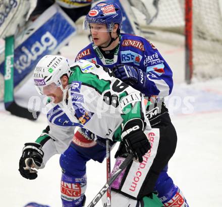 EBEL. Eishockey Bundesliga. EC  VSV gegen HDD TILIA Olimpija Ljubljana. Andreas Wiedergut,  (VSV), Jure Stopar (Laibach). Villach, am 30.1.2011.
Foto: Kuess 


---
pressefotos, pressefotografie, kuess, qs, qspictures, sport, bild, bilder, bilddatenbank