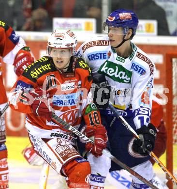 EBEL. Eishockey Bundesliga. KAC gegen VSV. Tyler Scofield, (KAC),  Michael Raffl (VSV). Klagenfurt, am 4.2.2011.
Foto: Kuess 

---
pressefotos, pressefotografie, kuess, qs, qspictures, sport, bild, bilder, bilddatenbank