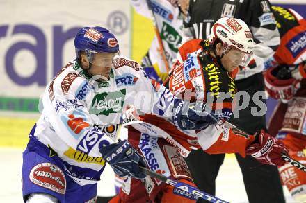 EBEL. Eishockey Bundesliga. KAC gegen VSV. Paul Schellander, (KAC),  Roland Kaspitz (VSV). Klagenfurt, am 4.2.2011.
Foto: Kuess 

---
pressefotos, pressefotografie, kuess, qs, qspictures, sport, bild, bilder, bilddatenbank