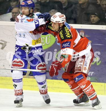 EBEL. Eishockey Bundesliga. KAC gegen VSV. Mike Craig, (KAC),  Roland Kaspitz (VSV). Klagenfurt, am 4.2.2011.
Foto: Kuess 

---
pressefotos, pressefotografie, kuess, qs, qspictures, sport, bild, bilder, bilddatenbank